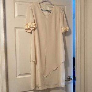 This is a perfect cocktail dress or bridal dress